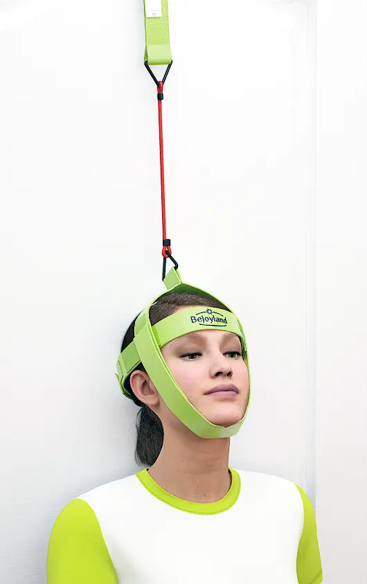 Woman performing a neck flexor stretch using the Bejoyland NECKY adjustable neck trainer